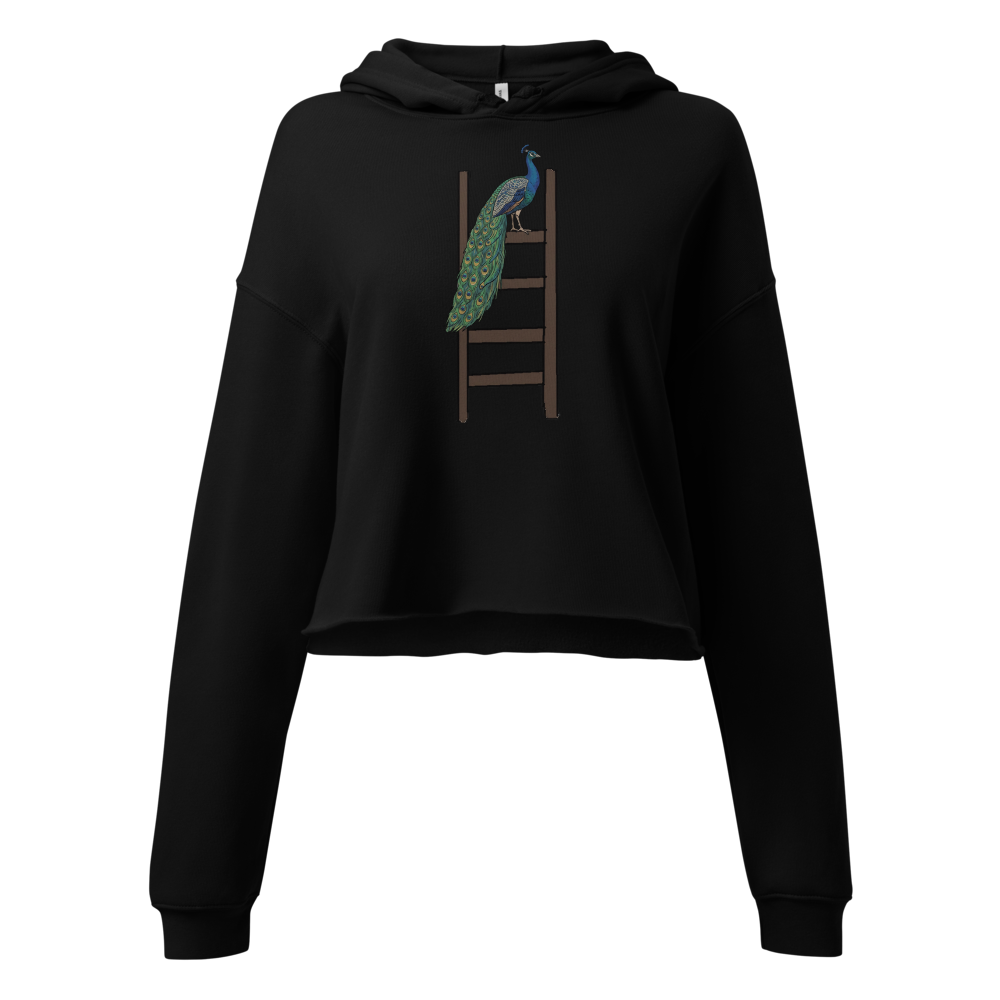ladder with a peacock on top